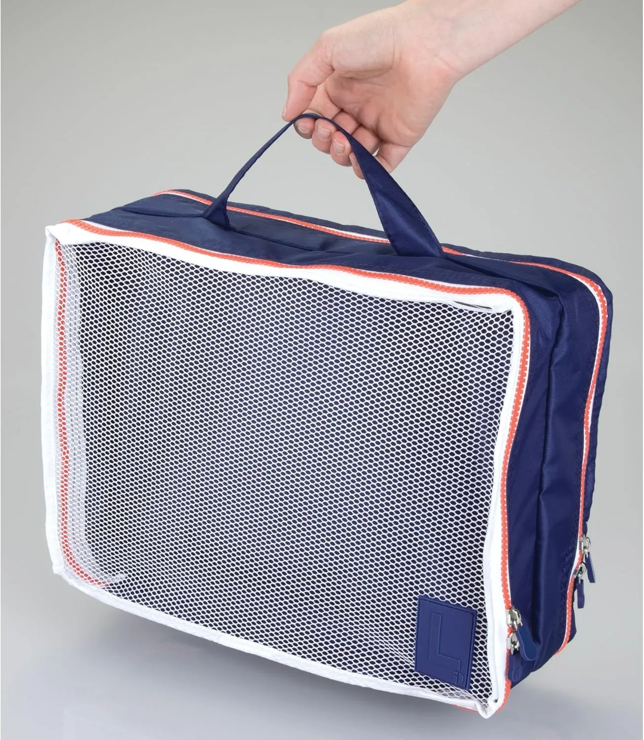 InterDesign Lightweight Water Resistant, Double Sided Organizer Cube with Handle for Packing Travel Suitcases Navy/Orange